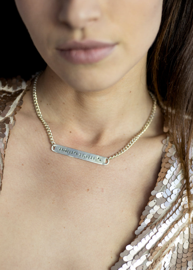 Girl wearing a silver handmade Ithaca necklace by 3rd Floor Handmade Jewellery