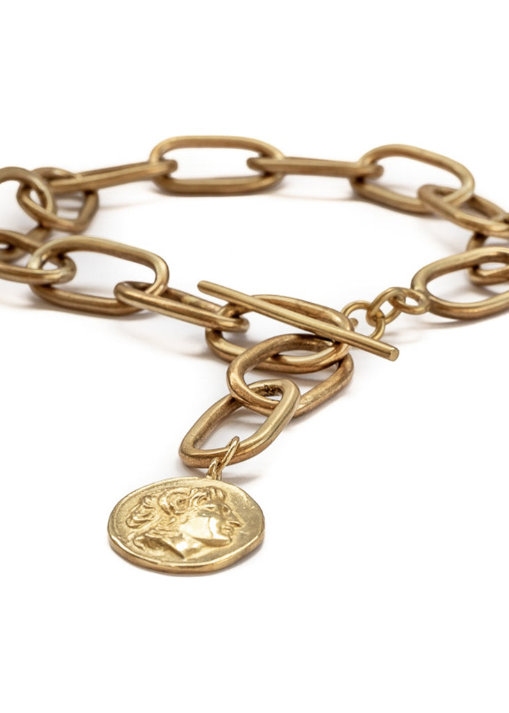 Gold adjustable big loop choker embellished with a round element portraying the head of Alexander the Great