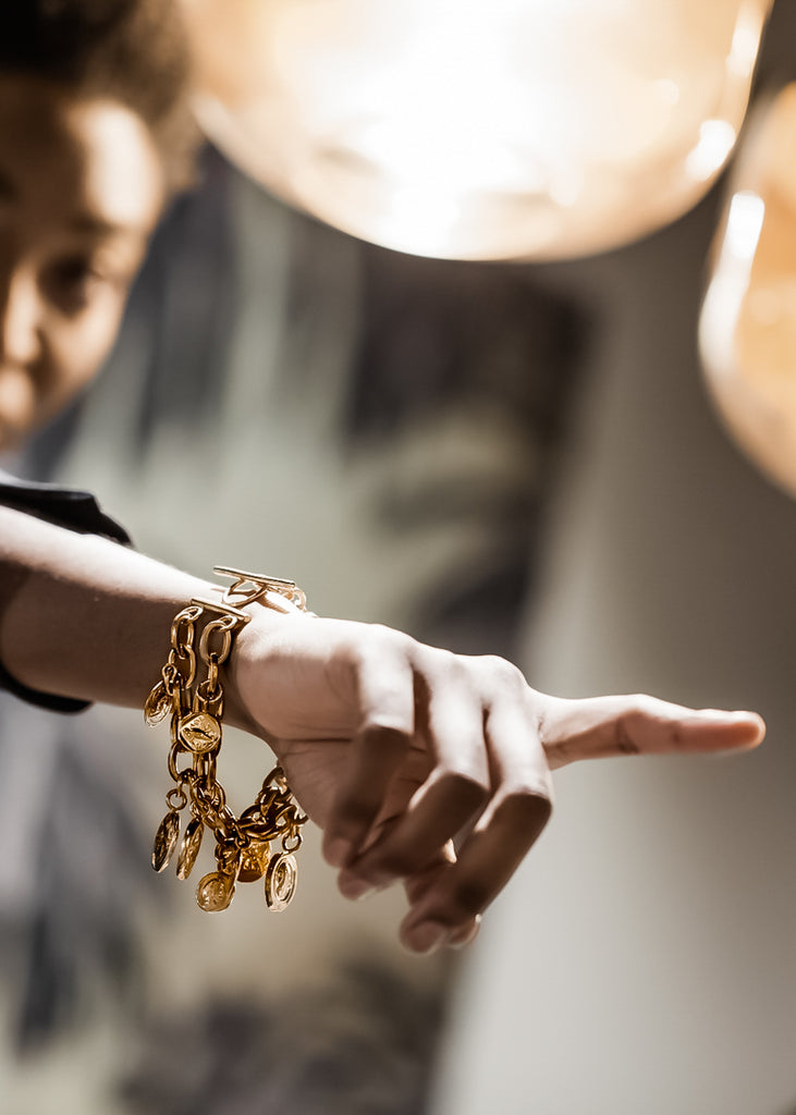 girl wearing Nomismata,Gold plated brass, bracelet, handmade in Athens Greece