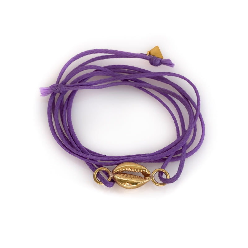 Purple colored, double, cord bracelet with a center, gold colored seashell