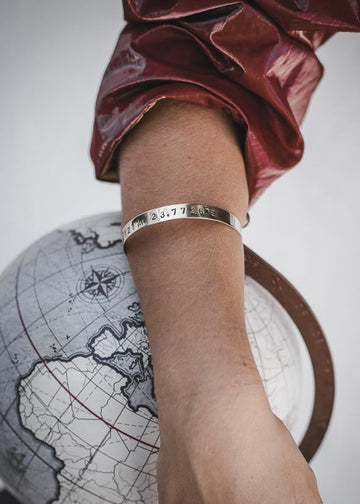 woman with 3rd-floor handmade coordinates bracelet marco silver