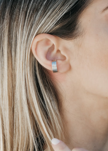 close-up woman, with ivele ear-cuff, silver