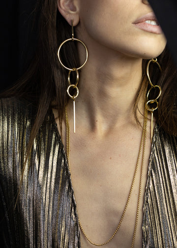 woman close-up wearing,Gold, pendant, link earrings by 3rd Floor Lab