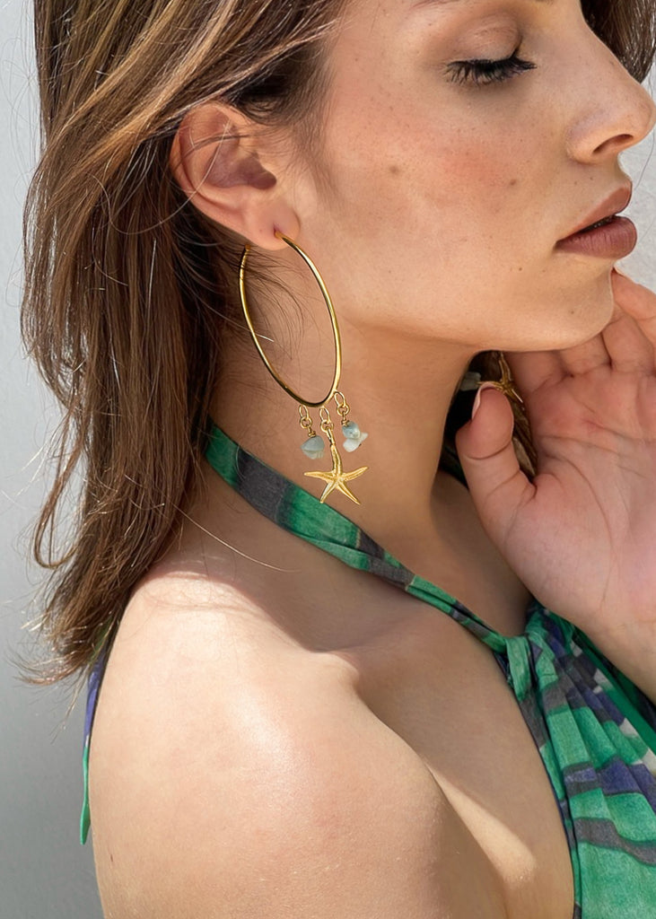 woman, with handmade earrings, gold, opal