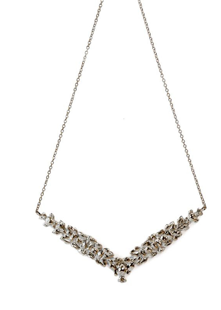 Hippolyta. Chain necklace, with a v-shaped pendant with embossed, intertwined flowers. By 3rd Floor Handmade Jewellery