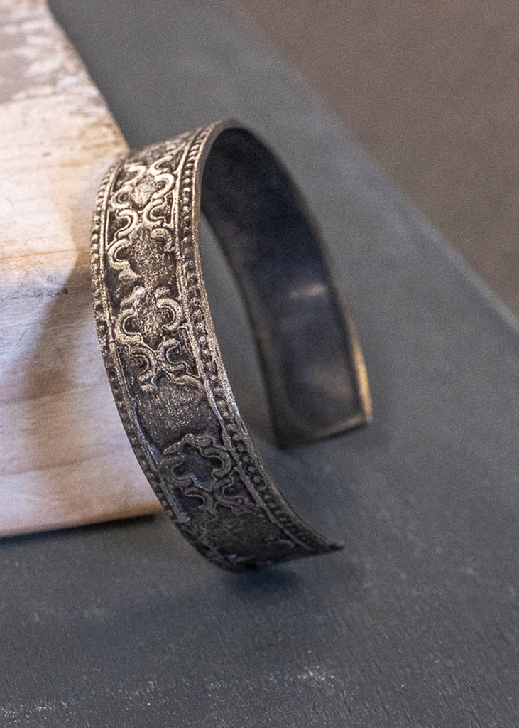 Adele. Black, adjustable bracelet, with embossed designs. By 3rd Floor Handmade Jewellery
