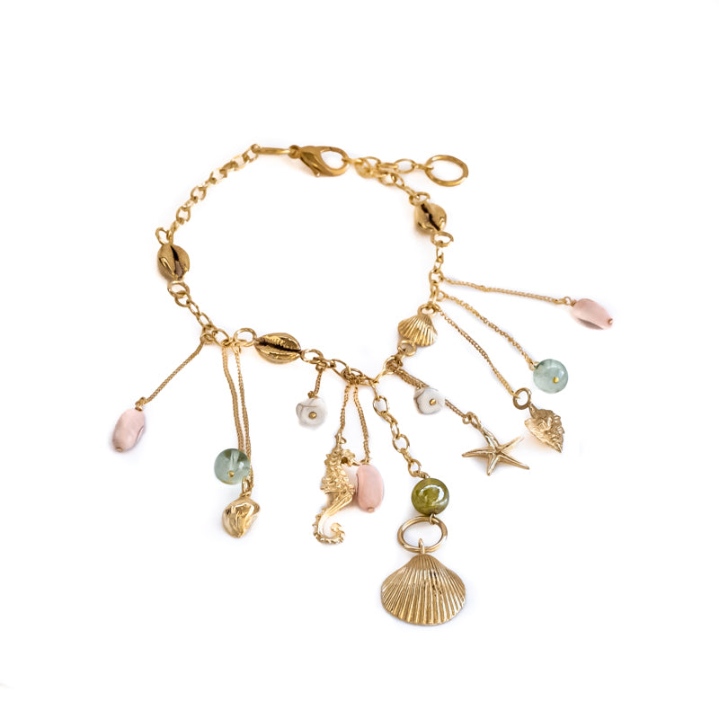 Bailar. Gold charm necklace, with summer charms, and colorful stones. By 3rd Floor Lab