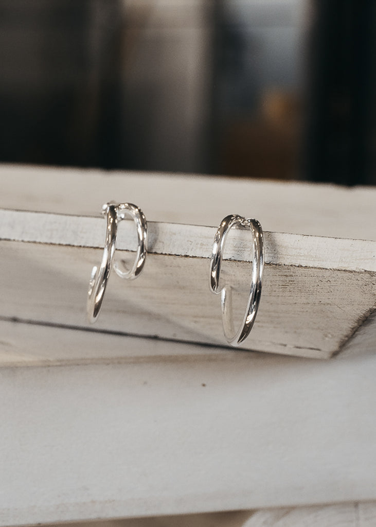Pair of unique, silver, loop earrings 