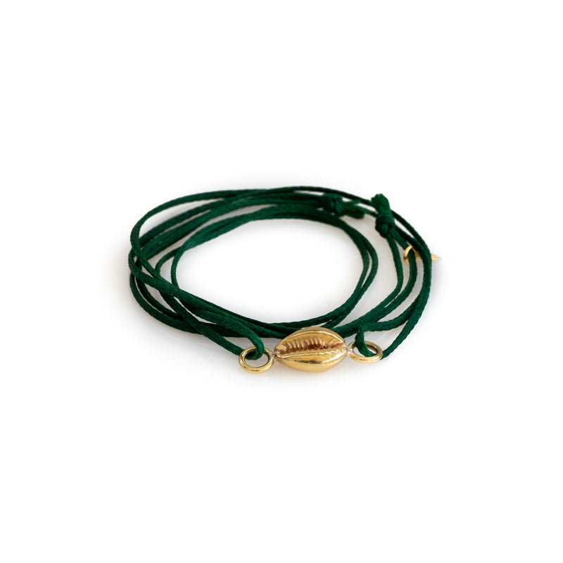 Pine green cord bracelet with a center, gold colored seashell
