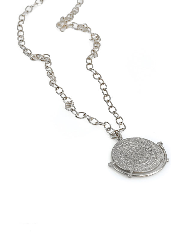 Phaistos Disc. Handmade,silver pendant, with a replica of the Disc of Phaistos
