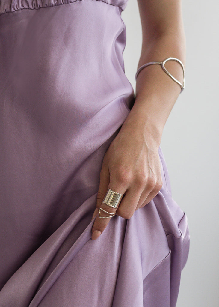 girl with purple dress, wearing Handmade Ring Snail big silver 925 by 3rd-floor jewellery