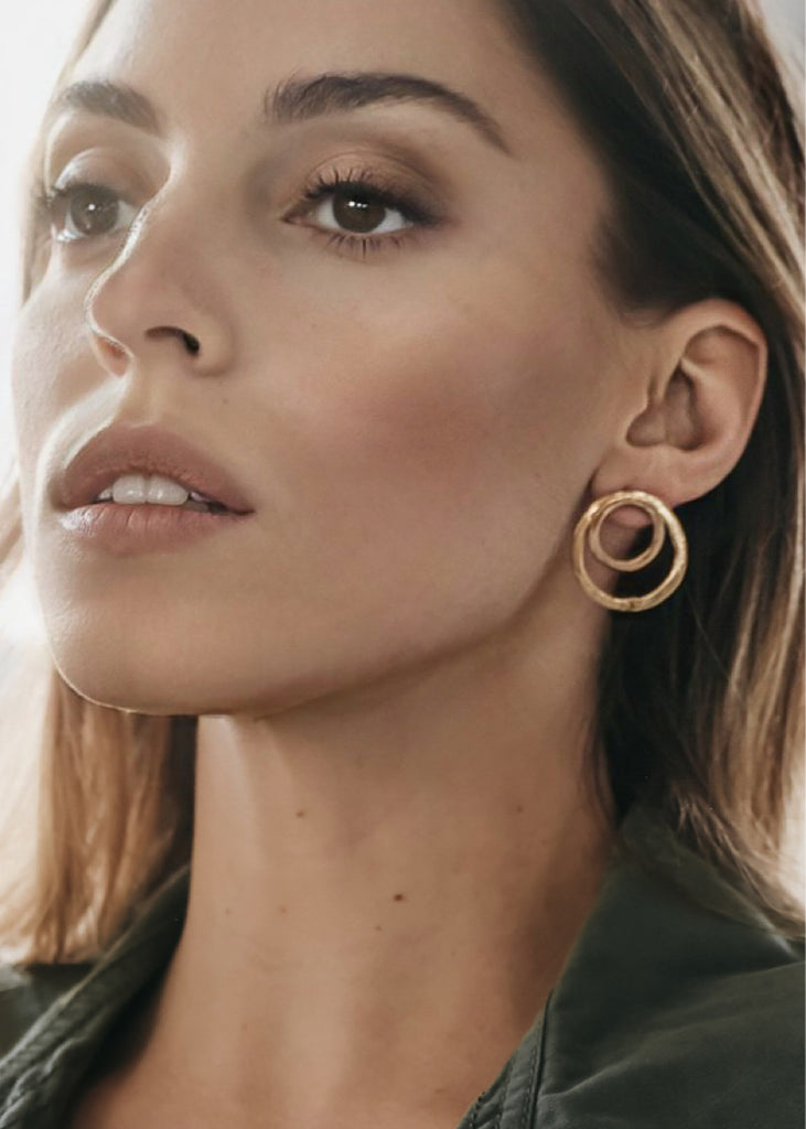 model with the Twin earring