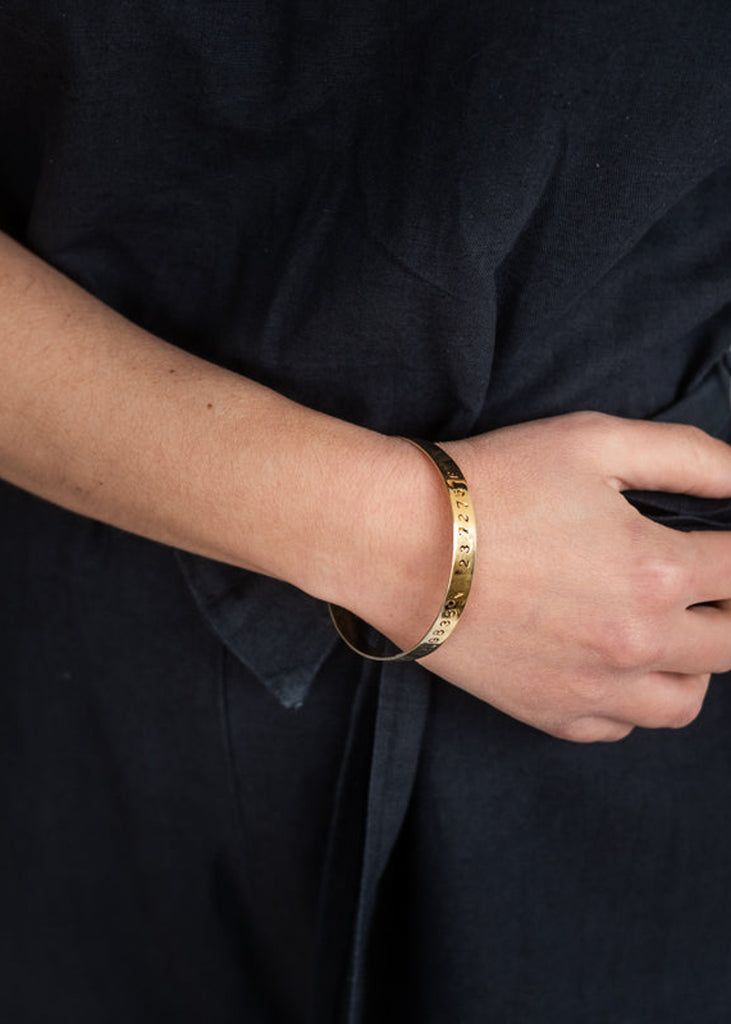 woman with 3rdfloor handmade coordinates bracelet marco polo gold