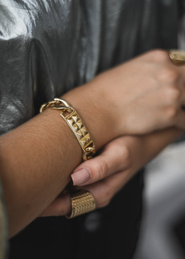 womens hand with Cicero. Handmade, gold plated brass, chain bracelet. By 3rd Floor Handmade Jewellery