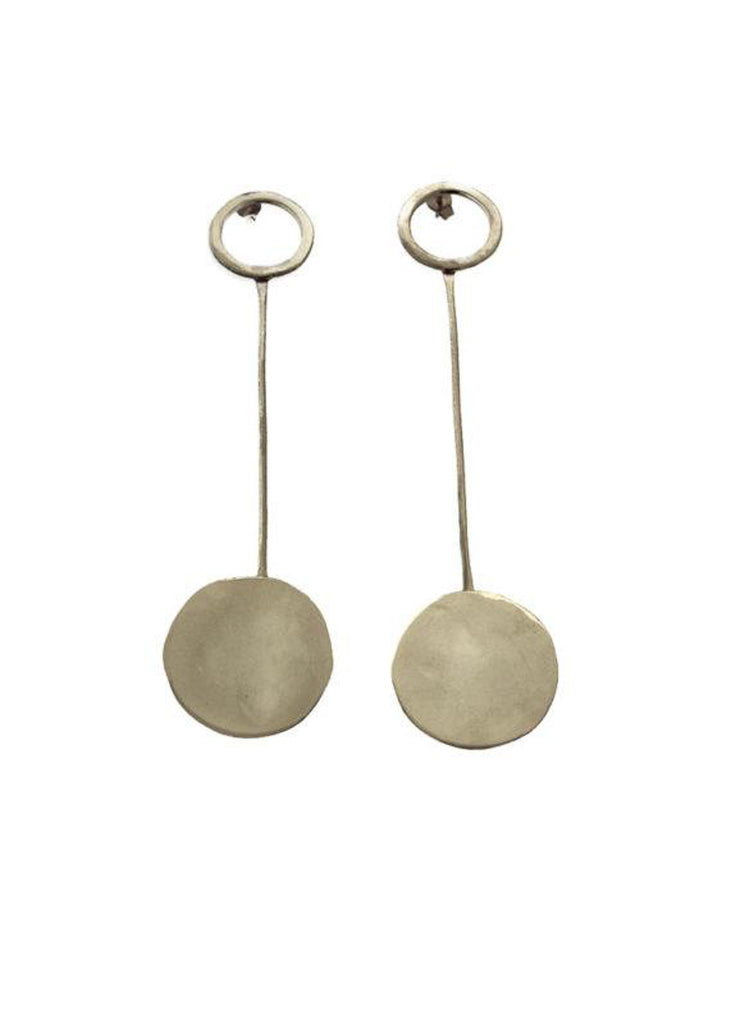 Pair of silver pendant earrings on a white background. Darya earrings by 3rd Floor